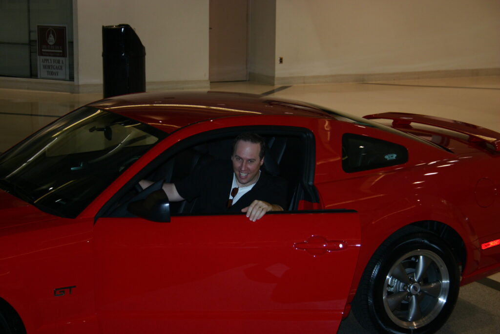 Doug in a mustang for an atrium project