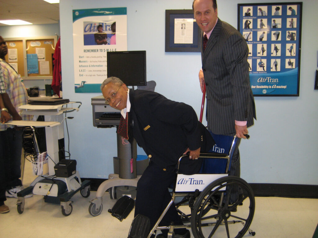 Doug using Lean principles while testing rear luggage carrying wheelchairs