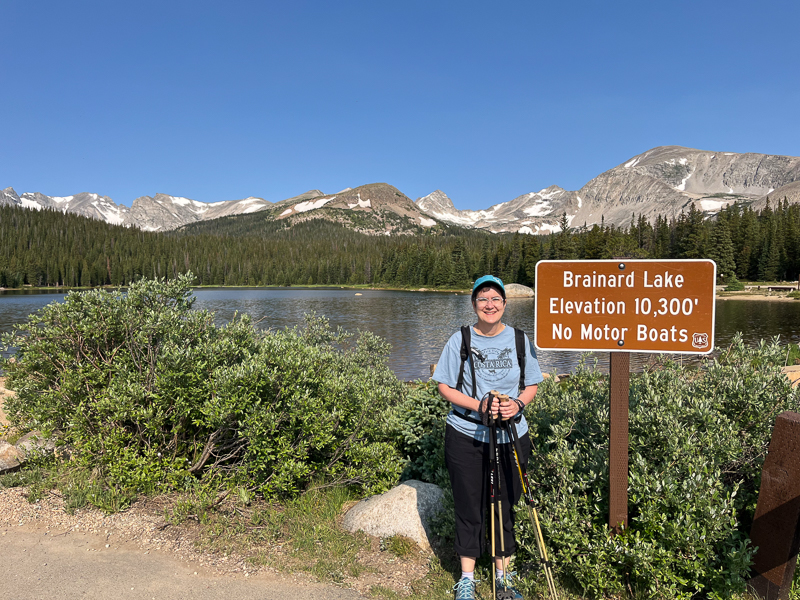 Lale standing in front of Brainard Lake