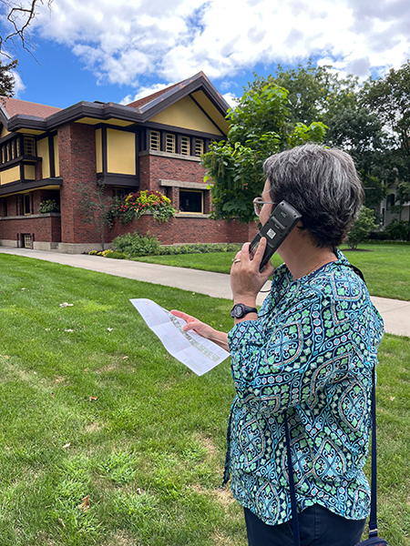 Lale in front of one of Frank Lloyd Wright's designs