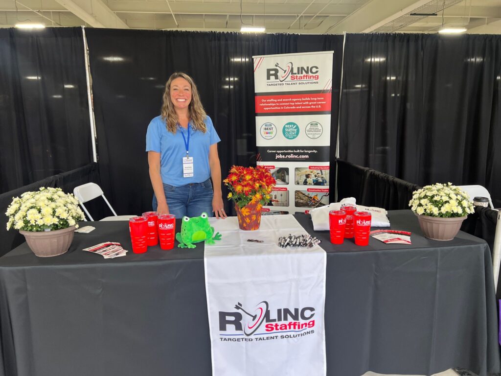 Alexis representing ROLINC at an event